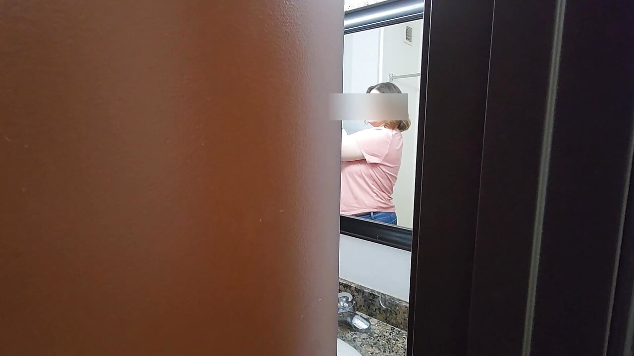 Peaking in on milf in the bathroom