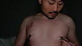 Indonesian Chindo Playing with Nipple Clips snapshot 2