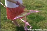 Nubile 18yo Kitty playing with a kite snapshot 1