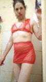 Boy wearing sexy red women's lingerie snapshot 11