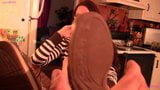 Penny nerdy Sperry fondling on table, sock removal bare PREV snapshot 6