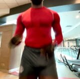 Running commando at the gym in a sexy spandex short snapshot 2