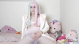 Ayria Moon in a pastel rainbow wig rubs her cock in nylons snapshot 3