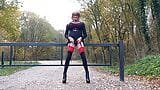 Crossdressed Outdoors in Goth Dress snapshot 4