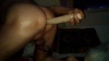 Boy in chastity fucks dildo. snapshot 6