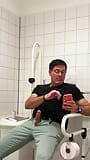 Jerking off in a public restroom at the medical building. Unedited snapshot 1