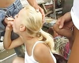 A slim blonde beauty from Germany gets pounded by two hard cocks outdoors snapshot 4