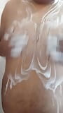 Gordito bator jugando en la ducha con sus tetas snapshot 3