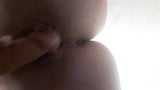 Dildo in pussy. Close-up snapshot 1