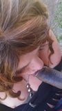 Une trans mature baisée en plein air par une grosse bite noire snapshot 2