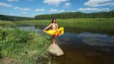 Color Fans on Boulder in Volga River snapshot 2