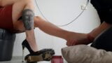 Foot massage for Dominatrix Nika. A slave gives a foot massage to his mistress. Foot kissing, foot domination snapshot 7