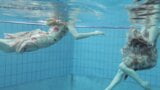 Two dressed beauties underwater – Netrebko and Poleshuk snapshot 6