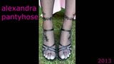 my feet and legs in black pantyhose  and sandals snapshot 6