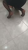 Cleaning lady in hijab and pantyhose snapshot 1