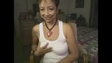 Une GILF  sexy devant une webcam snapshot 19