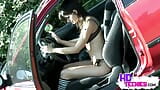 Linda lluvia mostrando tetas medias y culo en coche rojo snapshot 3