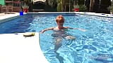 AuntJudys - Peituda madura ruiva Melanie vai nadar na piscina snapshot 4