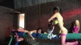 Three hot beauties have a sensual fuck with two guys in a plastic mini pool snapshot 2