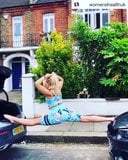 Louise Beckett doing a split between two cars snapshot 3