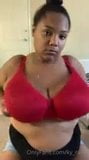 BBW jiggling her big black tits in a bra snapshot 2