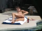 Big tit girlfriend giving a handjob outside by the pool snapshot 4