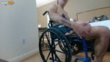 Handicapped guy wheels around hotel room naked in wheelchair snapshot 7