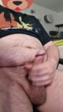 Horny chub at desk, having a wank snapshot 6