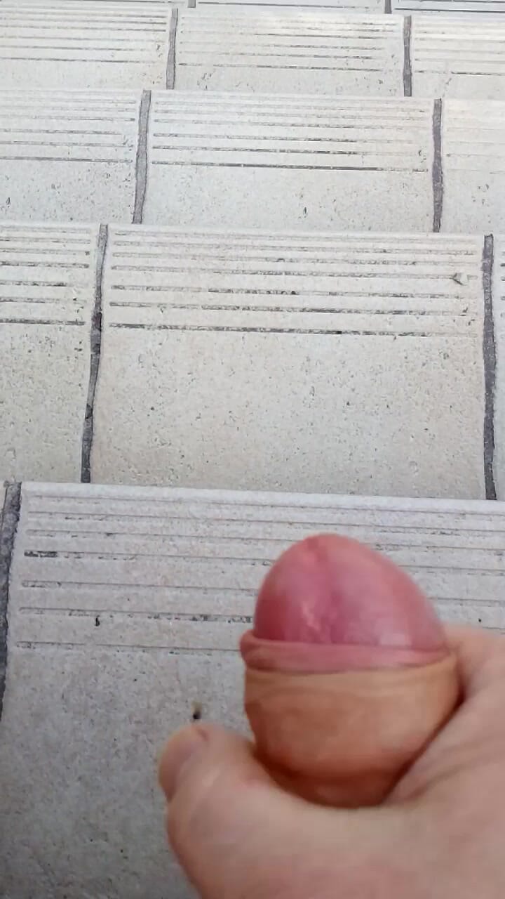 Toni cums on stairs outdoor, almost caught