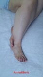 Another perspective, Anna looks beautiful in bed with bare feet. Do you think it's beautiful? snapshot 4