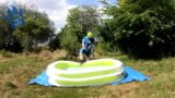 Cyclist pup in pool - cooling down and pawing off snapshot 2