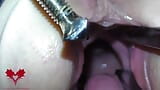 The mistress' cunt is opened with a hole expander so that you can study her cervix. snapshot 13