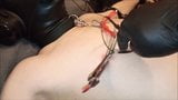 Tied and maske slave in electrostimulation session snapshot 13