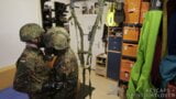 Two soldiers in German Flecktarn in gas masks wanking snapshot 2