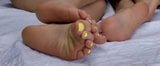 Friends feet soles wiggling yellow nails snapshot 1