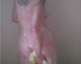 Tattoo'd girl showering snapshot 1