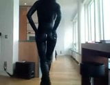 Posing in catsuit and boots snapshot 2