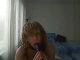 horny MILF tranny simulates a Blowjob playing with a vibrator in front of a webcam snapshot 5