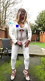 Amateur crossdresser Kellycd2022 sexy milf masturbating outdoors in white jumpsuit snapshot 9
