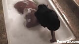 Black woman Chocolate Haze tit fucks and fucks with a dildo in bathtub snapshot 3