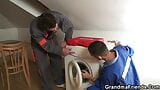 Repairmen banging busty granny from both ends snapshot 5