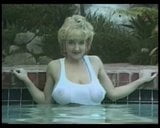 Busty blonde in a pool snapshot 2