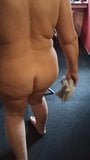 Flabby bodied  housewife walking around snapshot 10