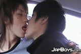 Japanese twinks kissing passionately in the back of the car snapshot 11