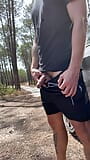 Short pee break in a public parking lot in the forest snapshot 2