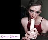 Sissy Slave Denise Humain works with her mouth on a Dildo for training. Sexy snapshot 2