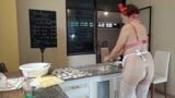 Nudist housekeeper Regina Noir cooking in the kitchen. Naked maid makes dumplings. snapshot 4