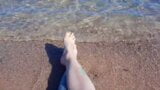 Dominatrix Nika enjoys the salty sea on her feet. snapshot 2