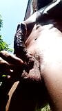 young black man cumming outdoors. snapshot 2