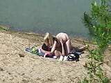 A couple of young nudists are spied on while having sex and snapshot 2